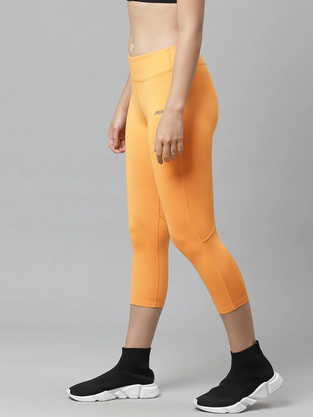 Alcis Nari Orange Solid Slim Fit Drytech  Cropped Tights